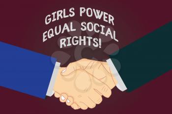 Writing note showing Girls Power Equal Social Rights. Business photo showcasing Feminism men and women gender equality Hu analysis Shaking Hands on Agreement Sign of Respect and Honor