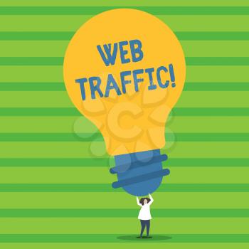 Writing note showing Web Traffic. Business concept for amount of data sent and received by visitors to website Person Standing Arms Holding Big Yellow Lightbulb for Ideas