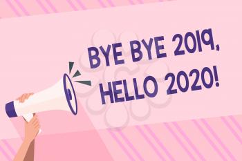 Text sign showing Bye Bye 2019 Hello 2020. Business photo text saying goodbye to last year and welcoming another good one Human Hand Holding Tightly a Megaphone with Sound Icon and Blank Text Space
