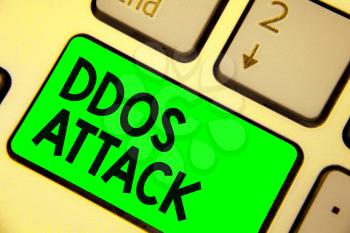Conceptual hand writing showing Ddos Attack. Business photo showcasing perpetrator seeks to make network resource unavailable Keyboard green key computer computing reflection document
