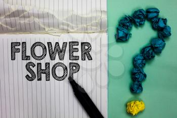 Conceptual hand writing showing Flower Shop. Business photo text where cut flowers are sold with decorations for gifts Notebook marker crumpled papers question mark on green background