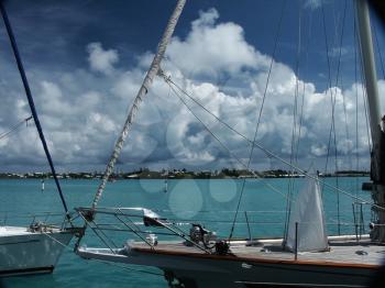 Sailboats in a beautiful bay. Cloudy sky