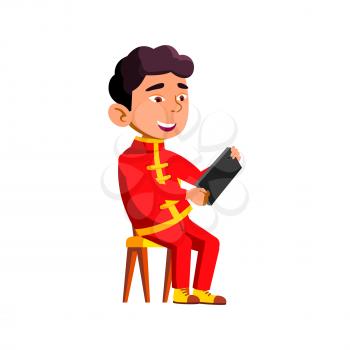 Kid Boy Using Smartphone Digital Gadget Vector. Asian Child Sitting On Chair And Playing Video Game On Smartphone. Japanese Character Playing Phone Application Flat Cartoon Illustration