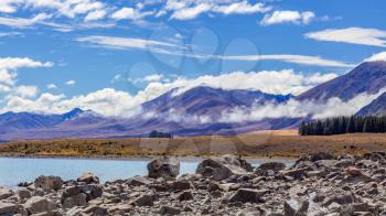 The rocky shore of Lake Tekapo