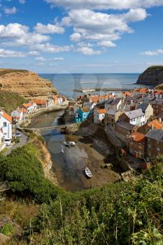 STAITHES, NORTH YORKSHIRE/UK - AUGUST 21 : View of Staithes Harbour North Yorkshire on August 21, 2010. Unidentified people