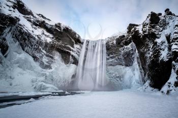 View of Skogafoss Waterfall in Winter