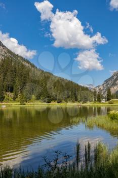 LAKE MISURINA, VENETO/ITALY - AUGUST 9 : View of Lake Misurina near Auronzo di Cadore, Veneto, Italy on August 9, 2020. Unidentified people