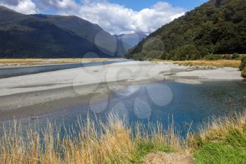 A scenic view of Jacob's River in summertime in New Zealand