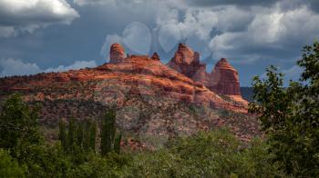 Stormy weather and bright sunshine over mountains surrounding Sedona