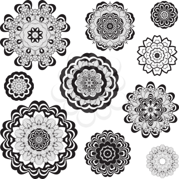 Round flower ornament in black and white, zentangle style.