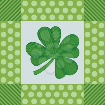 Green shamrock or clover decorative embroidery illustration.