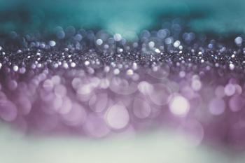 Decorative glitter silver and purple as abstract filtered background