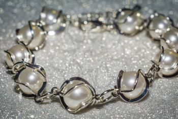 Decorative fashion bracelet made of fake pearls, imitation.
