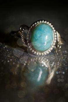 Fashion silver ring with light blue natural larimar stone.