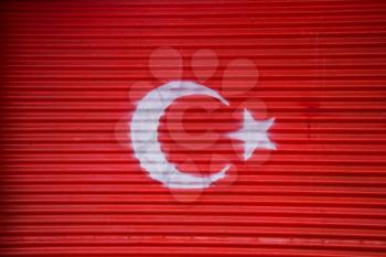Turkish national  flag painted on metal background in the street