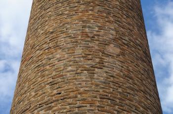 Brick chimney of an old derelict factory.