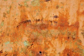 Rusty peeling metal surface. Abstract industrial texture.
