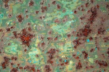 Chipped green paint rusty metal surface. Abstract industrial iron texture.