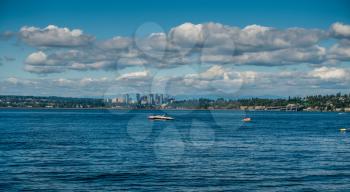 A view of the skyline in Bellevuie, Washington.  Lake Washington in the foreground.