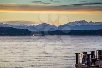 A view of the Olympic Mountains across the Puget Sound at sunset.