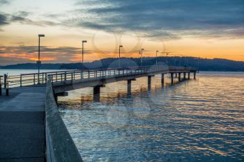 A view of the pier at Des Moines, Washington at sunset.