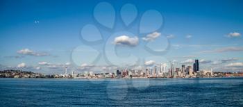 Panoramic view of the Seattle skyline on a sunny day.