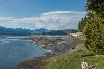A view looking north from the south end of Hood Canal in Washington State. The Olympic Mountain can be seen in the distance.