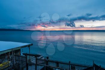 The sun sets behind the Puget Sound in winter.