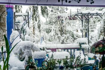 A front porch is buried in snow in Burien, Washington.