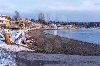 A view of snow along the shore in Normandy Park, Washington.