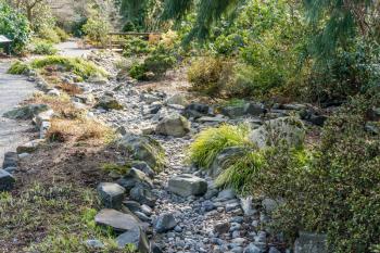 A view of a dry rocky creek bed in Seatac, Washington.