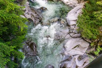 A view of  the clear water of Denny Creek in Washington State.