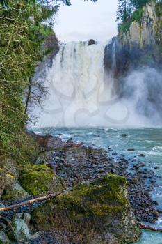 Water explodes at the bottom of Snoqualmie Falls in Washington State.