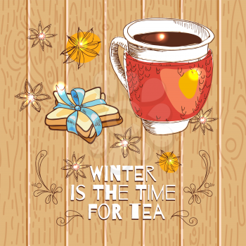 Tied with a cup of hot tea and cookies in the shape of a star with a blue ribbon on a wooden background. Star anise. Card.