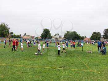 youth volleyball camp at park with kids and children being healthy sport outdoors