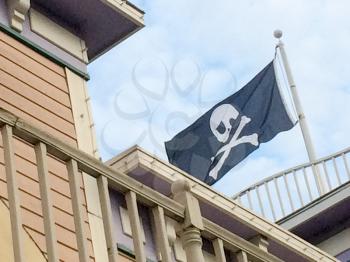 pirate flag jolly roger with skull and cross bones symbol