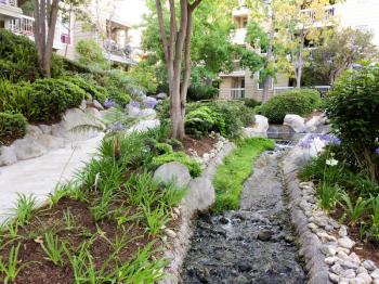 Beautiful modern landscaping waterscapes at residential housing condo apartment complex unit