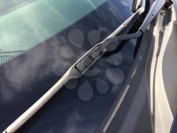 Car window wiper rubber blade close up black color on sunny day