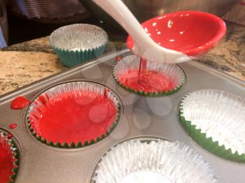 Making red velvet cupcakes with friends and family activity