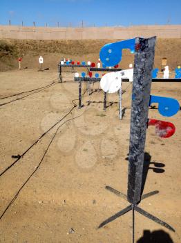 Metal targets at shooting range outdoor firearm rifle shotgun practice sunny