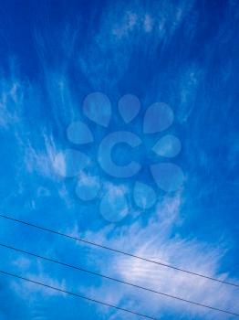Blue sky cloud electric power transmission lines background design element