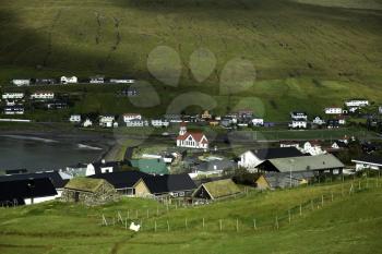 Panoramoc view of Sandavagur with its Church in the center, a beautiful village near Stora river, Faroe Islands, Denmark