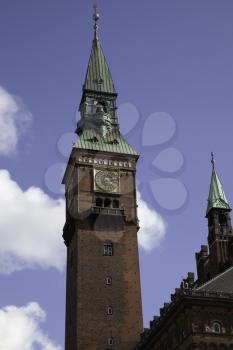 Clock tower of Copenhagen city hall and a blue sky, Denmark