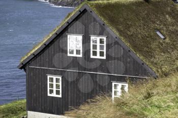 Bour, Faroe Islands - 14 September 2019 - Typical faroe house with grassy roof