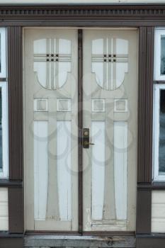 Parnu, Estonia - 18 January 2019: beautiful wooden carved door of residential house on Supeluse 9 street