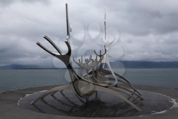 Reykjavik, Iceland - 17 June 2014: Sun Voyager on a gloomy day with dramatic sky