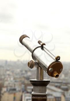 Telescope and a view of Paris from Sacre coeur basilica in France