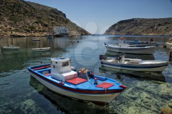 Fishing boat floating on aegean sea in Sifnos, Greece
