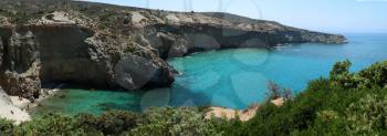 Beautiful turquoise water at Tsigrado beach in Milos island in Greece