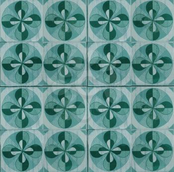 Photograph of traditional portuguese tiles in mint green and dark green